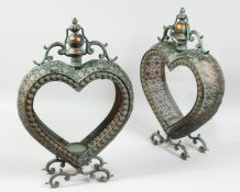 A PAIR OF COPPER HEART SHAPED LANTERNS.