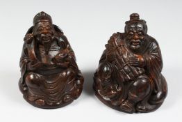 TWO SMALL 19TH CENTURY CARVED WOOD BAMBOO SEATED GODS. 6ins high.