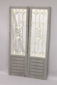 A PAIR OF GREY GARDEN MIRRORS. 5ft high 1ft 5ins wide.
