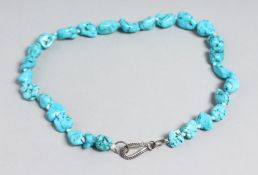 A TURQUOISE BEAD NECKLACE