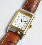 A LADIES JAEGAR LE-COULTRE WRIST WATCH with leather strap, No. 1880461.