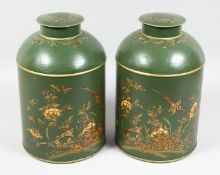 A PAIR OF TOLEWARE CHINESE DESIGN TEA JARS AND COVERS.
