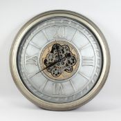 A LARGE ROUND MOVING GEARS WALL CLOCK 31ins diameter.