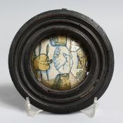 A VERY EARLY ITALIAN MAJOLICA CIRCULAR PLAQUE, ' Shaking Hands' 3ins diameter in a wooden frame.