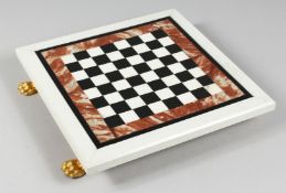 A MARBLE INLAID CHESS BOARD on four claw feet. 13ins