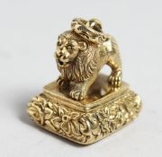 A GOLD PLATED LION SEAL.