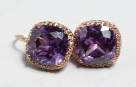 A PAIR OF AMETHYST EARRINGS.