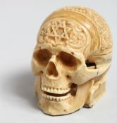 A CARVED BONE SKULL VERGE TABLE CLOCK, the movement by Massot, Geneva, 2.25ins.