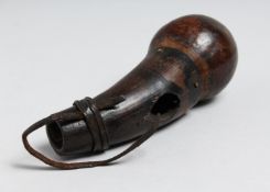 A SMALL TRIBAL HORN SNUFF BOTTLE 5ins long.