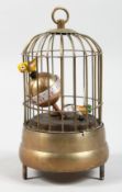 A SMALL BIRD CAGE CLOCK. 6ins high.