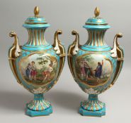 A VERY GOOD PAIR OF 19TH CENTURY SEVRES PALE BLUE TWO HANDLED URNS AND COVERS painted with reverse