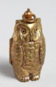 AN OWL DOUBLE SIDED SOVEREIGN HOLDER.