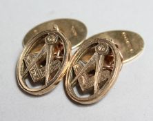 A PAIR OF 9CT GOLD MASONIC CUFF LINKS.