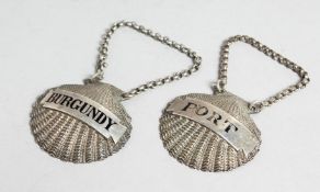 A GOOD PAIR OF GEORGE III CAST SILVER SHELL SHERRY LABELS. Burgundy and Port. London 1800. Maker