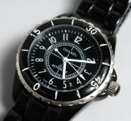 A CHANEL BLACK WRIST WATCH, No. Z G 58096.