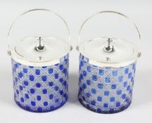 A PAIR OF BLUE GLASS AND PLATE BISCUIT BARRELS.