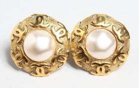 A PAIR OF CHANEL GILT AND MOTHER OF PEARL EAR CLIPS, No. 2908.