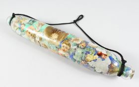 A DECALCOMANIA ROLLING PIN. 17ins long.