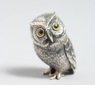 A CAST SILVER OWL PIN CUSHION.