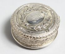 A GOOD FRENCH CIRCULAR SILVER SNUFF BOX