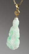 A GOLD MOUNTED GUANYIN JADE PENDANT AND CHAIN.