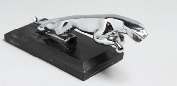 A JAGUAR CHROME CAR MASCOT.