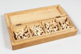 A BOX OF SHARKS' TEETH.