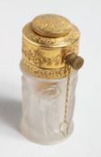 A GOOD LALIQUE SCENT BOTTLE the sides with six nudes and gilt top. 2.75ins high.