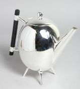 A CHRISTOPHER DRESSER DESIGN EGG SHAPED SILVER PLATED TEA POT.