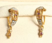 A PAIR OF 220 GOLD MULTI STONE EARRINGS.