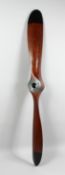 A WOODEN PROPELLER. 5ft long.