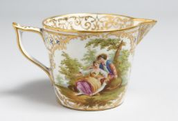 A GOOD PORCELAIN MILK JUG painted with reverse panels. Gold anchor mark. 3ins high.