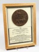 A FRAMED AND GLAZED W W 1 BRONZE MEMORIAL DEATH PLAQUE or 
