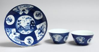 TWO BOW POWDER BLUE TEA BOWLS AND A SAUCER with Chinese vignettes.