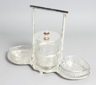 A SILVER PLATED HEART SHAPED JAM SET.