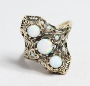 A 9CT GOLD OPAL SET RING.