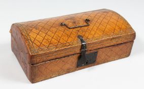 A GEORGE III TOOLED LEATHER DOOMED TOP BOX, dated 1807. 10ins long.