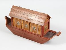 A PAINTED WOOD NOAH'S ARK. 15ins long.
