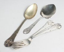 J REPPIEN A PAIR OF ART DECO SILVER FORKS AND TWO SPOONS in a repousse box.