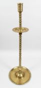AN UNUSUAL LARGE 18TH / 19TH CENTURY BRASS CANDLE STAND, with a central turned column, broad drip