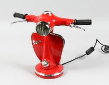 A RED 'VESPA' LAMP.