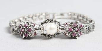 A SILVER, RUBY, PEARL, MARCASITE AND PEARL PANTHER BRACELET.