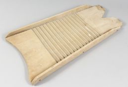 A PINE WASH BOARD. 23ins long.