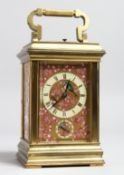 A SUPERB 19TH CENTURY FRENCH BRASS REPEATER CARRIAGE CLOCK. Retailed by M Hayes & Co. with porcelain