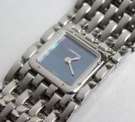 A LADIES CARTIER STEEL WRISTWATCH, NO. 73688 P8 2420 in original box.