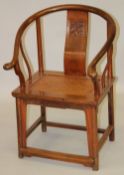 A GOOD CHINESE ELM WOOD HORSESHOE SHAPE CHAIR, with carved back splat and woven seat panel, 94cm