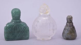 AN INDIAN ROCK CRYSTAL SCENT BOTTLE, 6.5cm, together with a small jade scent bottle, 4cm, and