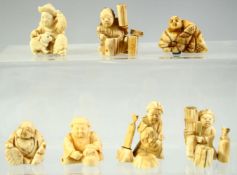 A GROUP OF SEVEN JAPANESE CARVED IVORY NETSUKES, of various figures, (7).