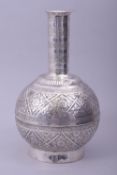 AN INDIAN OR SOUTH EAST ASIAN WHITE METAL BOTTLE, with engraved and chased floral decoration, 23cm