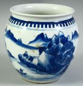 A SMALL CHINESE BLUE AND WHITE PORCELAIN PLANTER, painted with a mountainous river landscape, the